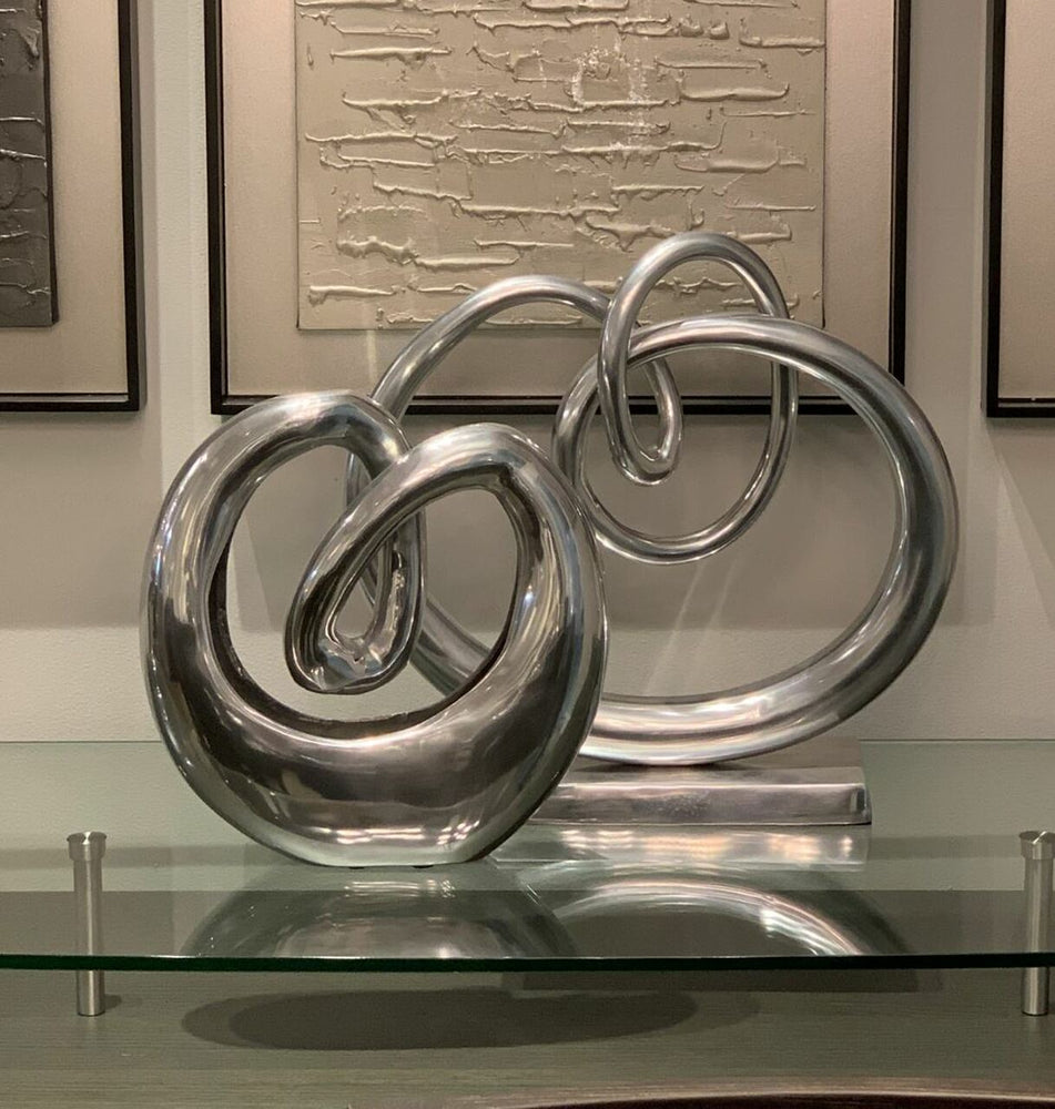 5" x 17" x 17" Buffed Twisted Knot Sculpture