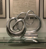 5" x 17" x 17" Buffed Twisted Knot Sculpture
